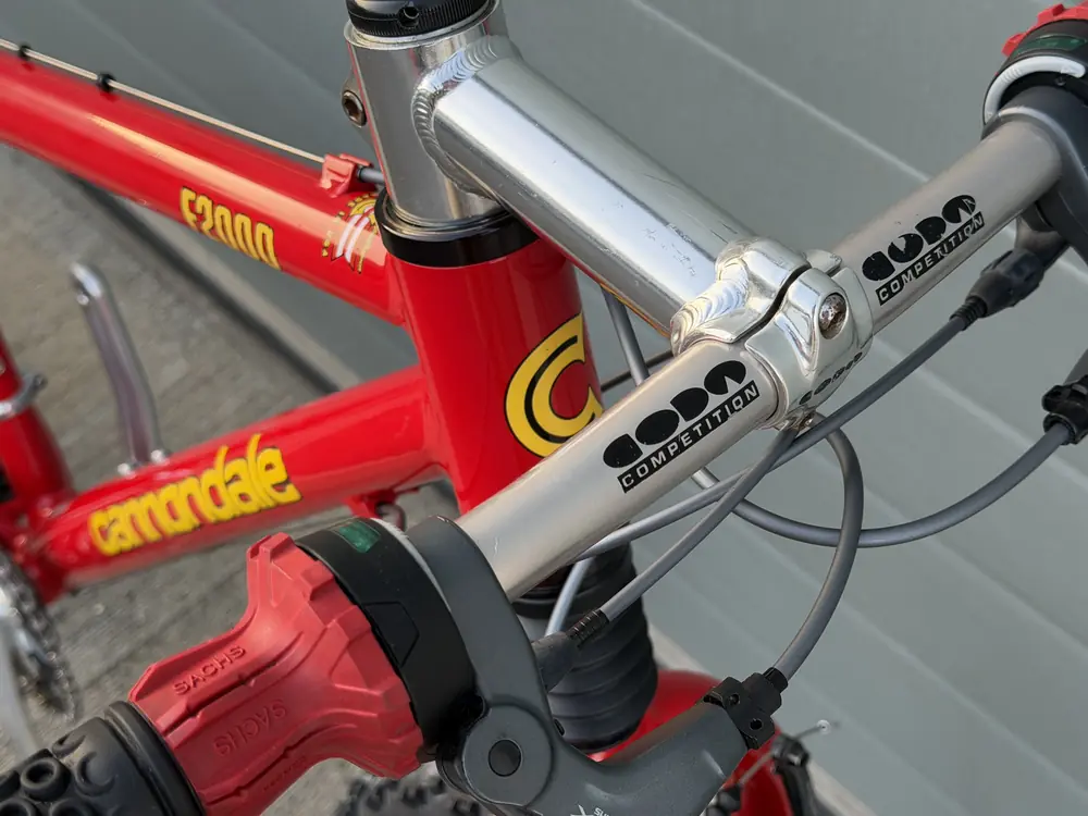Close up of the cockpit with Coda Competition bar and stem