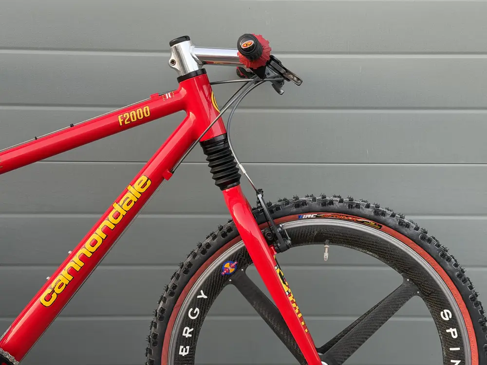 Close up of the F2000 head tube with the yellow C logo and decals